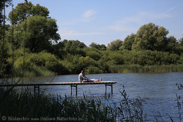 Wassersteg Mhlensee Kuschelpaar Grnufer romantisch Naturbild